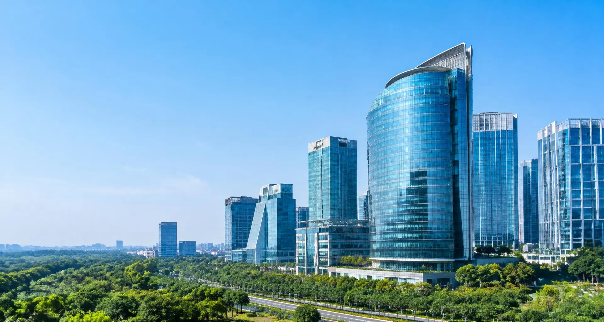 Illustrative view of Gurgaon's modern glass office skyline and green surroundings